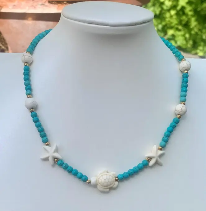 Collar turquesa amb estrelles de mar — Turquesa feta a mà, Mana Dragonfly
